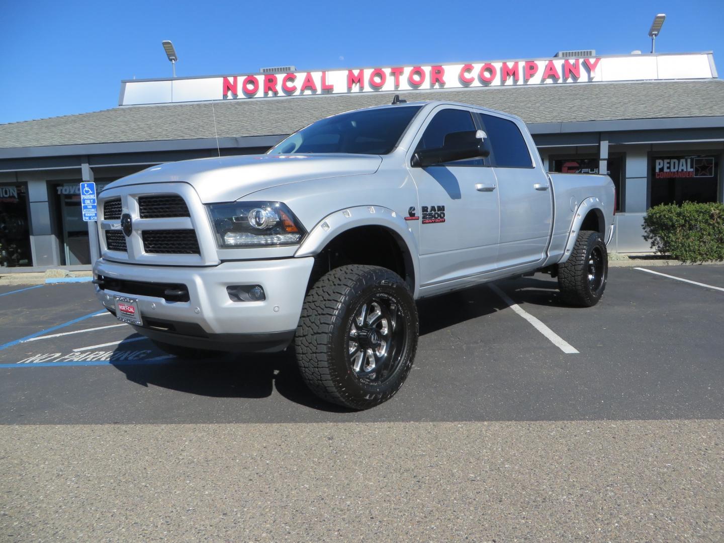 2016 SILVER /BLACK RAM 2500 Laramie Crew Cab SWB 4WD (3C6UR5FL3GG) with an 6.7L L6 OHV 24V TURBO DIESEL engine, 6A transmission, located at 2630 Grass Valley Highway, Auburn, CA, 95603, (530) 508-5100, 38.937893, -121.095482 - Leveled Ram sitting on Fuel Offroad wheels, Falken Wildpeak AT tires, Amp Power steps, Rolling Bed cover, Color matched fender flares, and window tint. - Photo#0